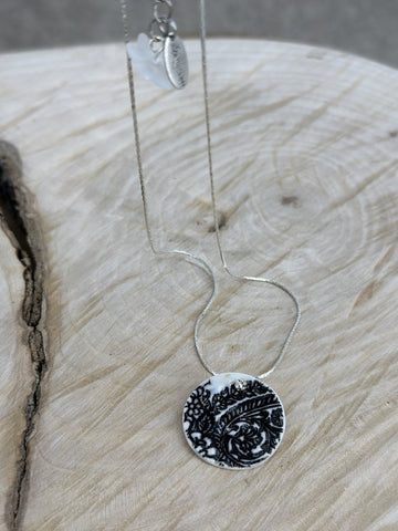 Black arabesque imprint